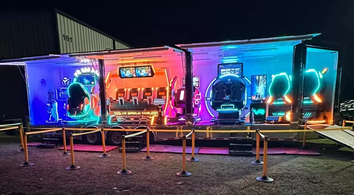 VR Gaming Trailer's Neon Glow at Night